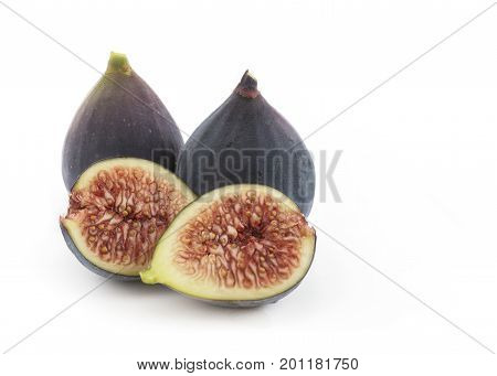 group of ficus carica common fig from the mulberry family whole and sliced isolated on a white background