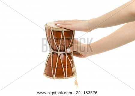 Female hands little drum on white background isolation