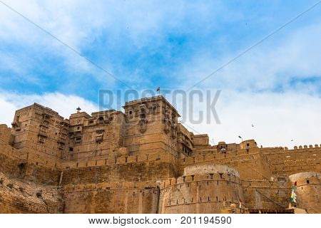 Wide angle picture of Jaisalmer Fort carved yellow sandstone architecture in Jaisalmer known as Golden City in India.