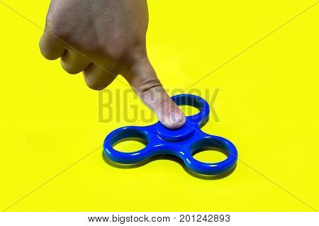 Anonymous Man Holding A Fidget Spinner Isolated