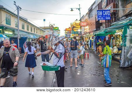 Bangkok, Thailand - August 23, 2017: People walking along the busy streets of Khao San Road in Bangkok, Thailand.