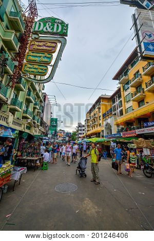 Bangkok, Thailand - August 23, 2017: People walking along the busy streets of Khao San Road in Bangkok, Thailand.