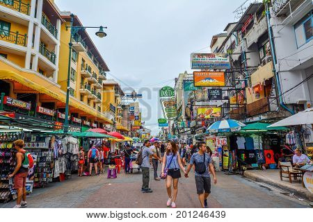 Bangkok, Thailand - August 23, 2017: People walking along the busy streets of Khao San Road in Bangkok, Thailand.