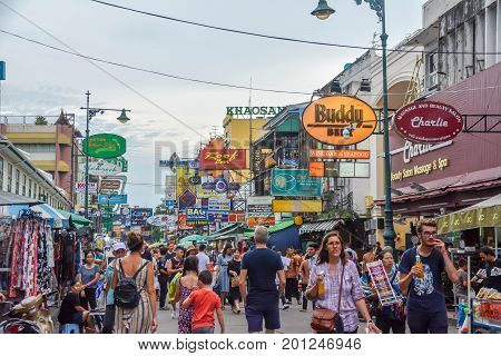 Bangkok, Thailand - August 23, 2017: People walking along the busy streets of Khao San Road in Bangkok, Thailand.
