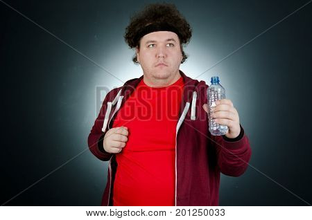 Run. Funny fat man in a hurry. Body care and a healthy lifestyle.