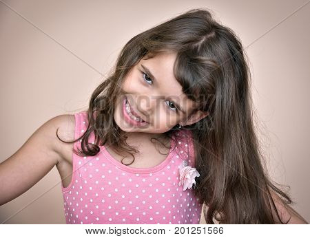 Cute young girl making a funny face