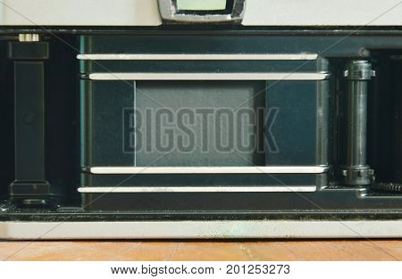 single lens reflect camera open film pressure plate and showing shutter curtain