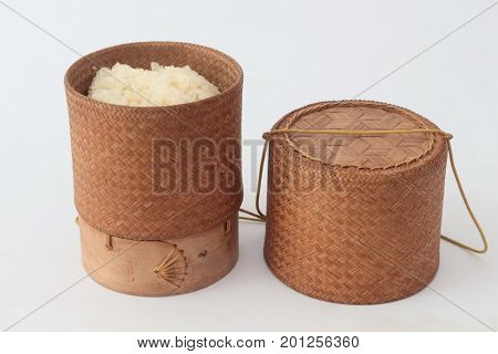 bamboo container for holding cooked glutinous rice.