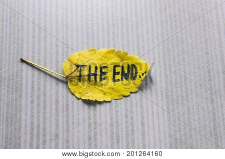 Yellow Leaf With Inscription The End