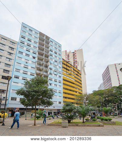 People Walking Between The Downtown Shops In Londrina