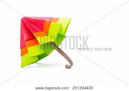 Origami paper umbrella multicolor on a white background