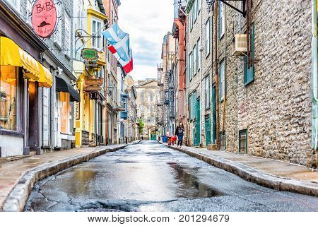 Quebec City, Canada - May 31, 2017: European Street In Upper Old Town Called Rue Garneau With Flags
