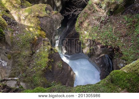Mountain brook in Alps the highest and most extensive mountain range system that lies entirely in Europe