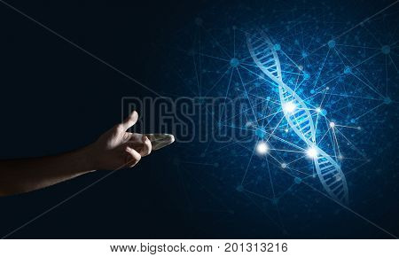 Close of man hand presenting DNA molecule research as concept. Mixed media