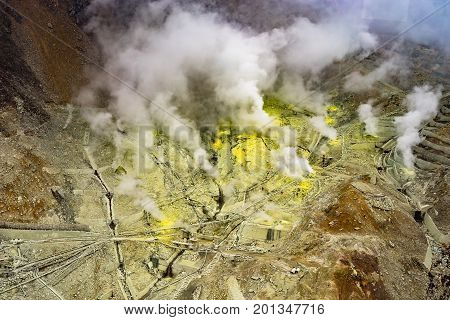 Sulphur gas protruding from ground of active mountain named Owakudani located in Hakone Japan. This area also can view Fuji mountain on bright day. Photo taken from Hakone ropeway.