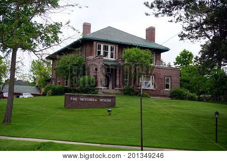 CADILLAC, MICHIGAN / UNITED STATES - MAY 31, 2017: 
The historic Charles T. Mitchell House is a brick home that is listed on the National Register of Historic Places.
