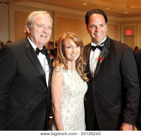 NEW YORK - MAY 8: (L-R) Director James Keach, Jane Seymour and Mike Piazza attend a cocktail party for the Ellis Island Medal of Honor awards at the Ritz-Carlton hotel on May 8, 2010 in New York City.