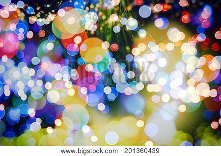 Abstract bokeh background. Christmas Glittering background. Abstract christmas background. Glittering Christmas background. Yellow christmas background Glitter christmas background.