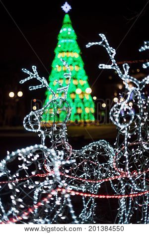 Lighting Decoration Deers With Christmas Tree On The Background In The City Of Gomel During New Year