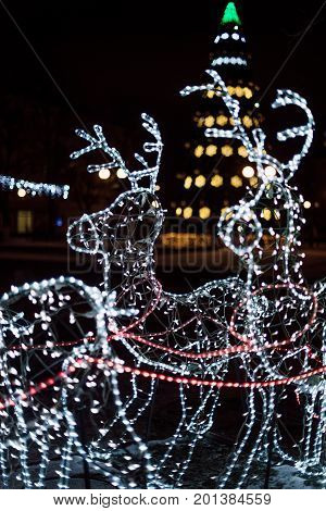 Lighting Decoration Deers With Christmas Tree On The Background In The City Of Gomel During New Year