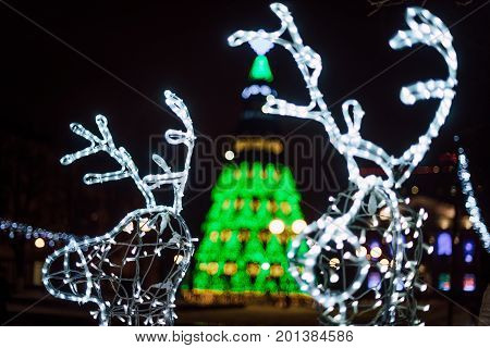 Lighting Decoration Deers With Christmas Tree On The Background In The City Of Gomel During New Year
