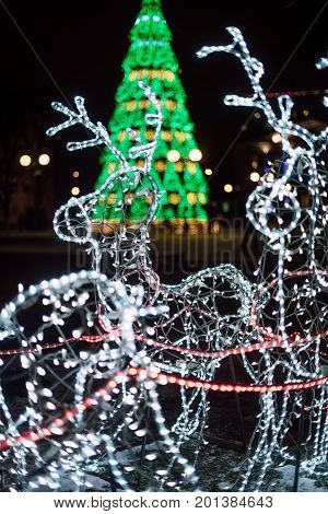 Lighting Decoration Deers With Christmas Tree On The Background In The City Of Gomel During New Year