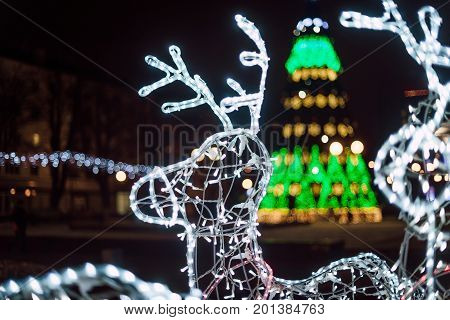Lighting Decoration Deers With Christmas Tree On The Background In The City Of Gomel During New Year
