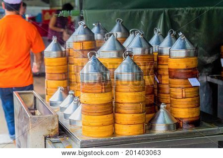 Many stack of bamboo rice steamers at chinese resterant