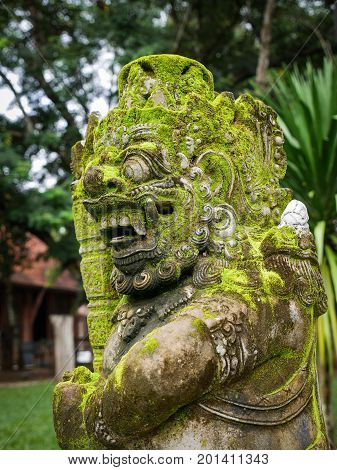 Rakasa Balinese Stone Sculpture Covered With Moss.