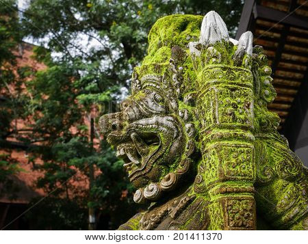 Rakasa Balinese Stone Sculpture Covered With Moss.