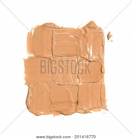 large square of nine tiny tokens from foundation on white background