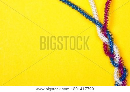 blue pink white rope on a yellow background