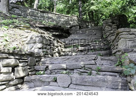 Tree shaded natural stone steps and walls at Letchworth State Park in New York