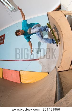 Skateboarder Performing A Backside Turn