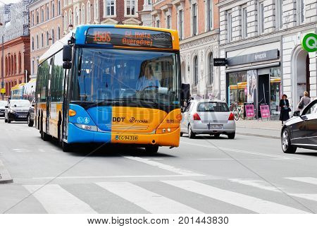 Copenhagen Denmark - August 24 2017: A One yellow public transport city bus near Norreport in Copenhagen city centerin service on line 150S.