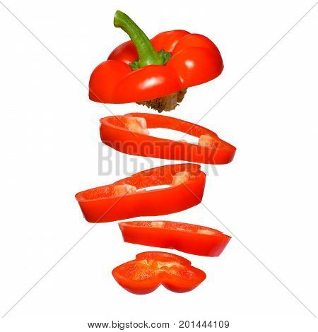 Creative concept with flying red paprika. Sliced floating pepper isolated. Levity vegetable. Capsicum