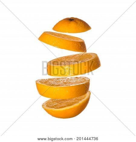 Creative concept with flying orange. Sliced orange isolated on white background. Levity fruit floating in the air.
