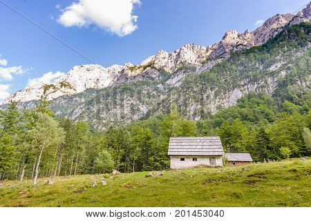 Mountain cabin, hut in European Alps, located in Robanov kot, Slovenia, popular hiking and climbing place with picturescue view