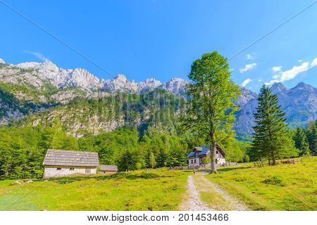 Mountain cabin, hut in European Alps, located in Robanov kot, Slovenia, popular hiking and climbing place with picturescue view