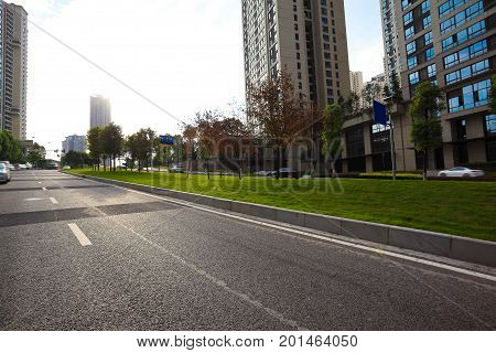 Empty Road Surface Floor With City Streetscape Buildings