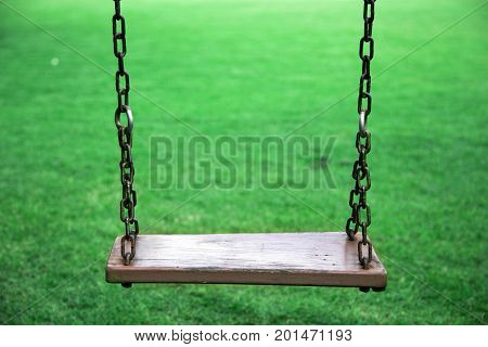 Empty Wood Seat On Swing Outdoor Game