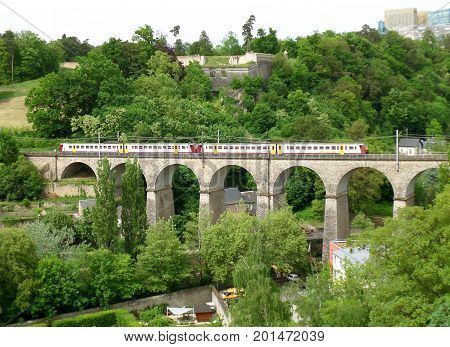 The Train Crossing the Passerelle, 24 Arches Viaduct in Luxembourg City, Luxembourg