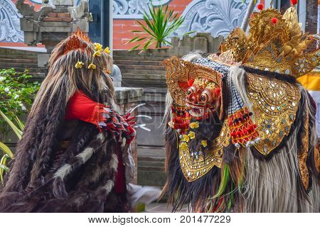 Bali, Indonesia - August 15, 2017: A regal character in a traditional Barong ceremony in Bali. The depiction of the battle between good and evil intertwines local history and mythology to create a parable for all ages.