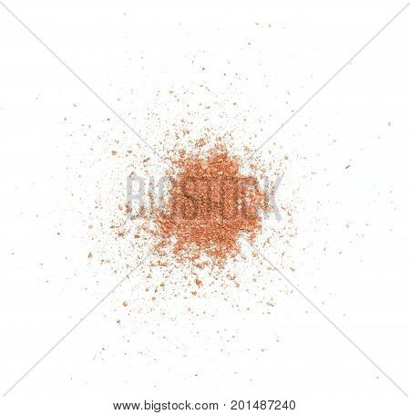 Spattered fine bronzer in the middle on white background
