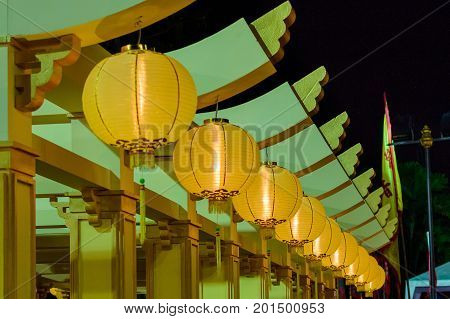 Yellow Chinese Paper Lanterns Decoration Taken At Night Street In Thailand