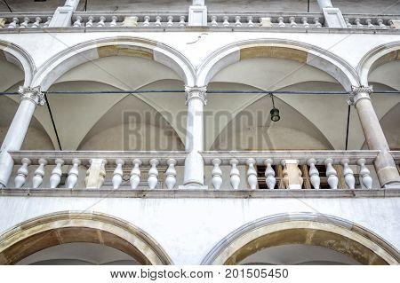 Krakow/Poland- August 14, 2017: Wawel Royal Castle, Sigismund I Stary's Palace courtyard arcades, close up