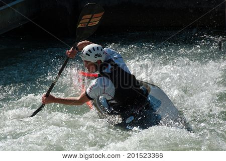 AUGSBURG, GERMANY - MARCH 28, 2017: Kayac slalom training to qualify for the Whitewater National Championships in Ottawa Canada 2017 using the course for the Summer Olympic Games in Germany in 1972.