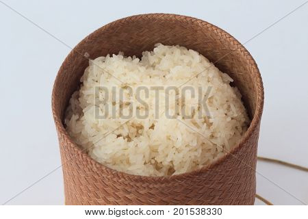bamboo container for holding cooked glutinous rice.