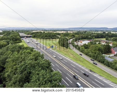 Aerial view of a highway intersection with a clover-leaf interchange in Germany Koblenz