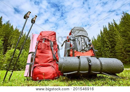 Backpacks in the mountains with views of the mountains.